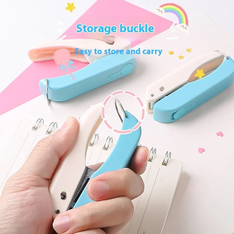 Small hand-held manual embossing punching machine with four pattern options for paper crafts