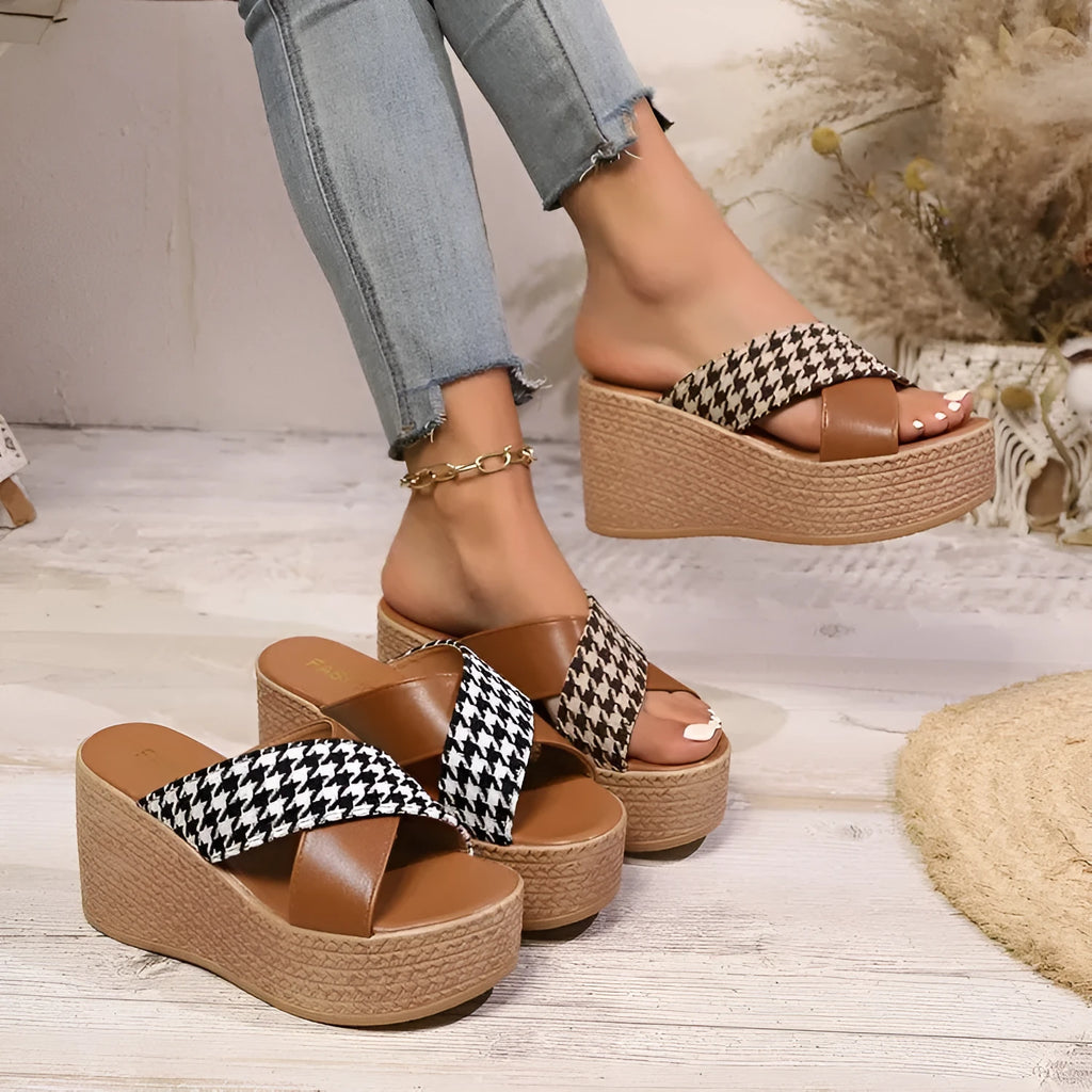 Cross leopard plaid wedge sandals in brown and black patterns with rubber sole and plastic upper