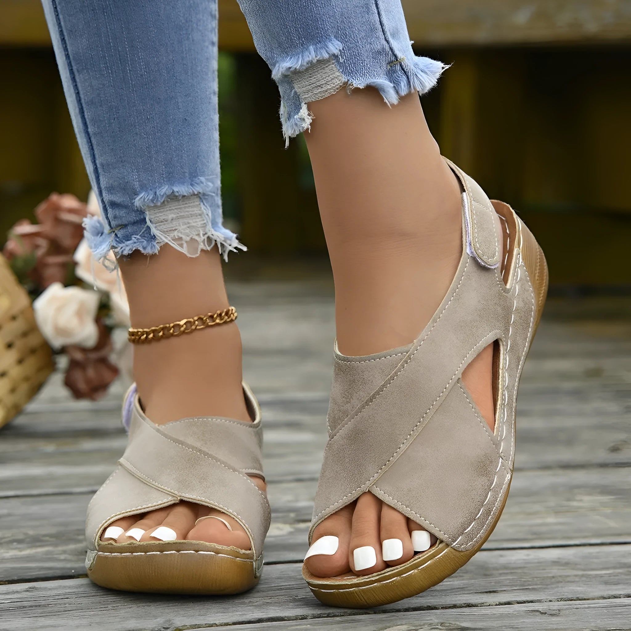 Roman platform sandals with a skirt detail and open toe design on a rubber sole