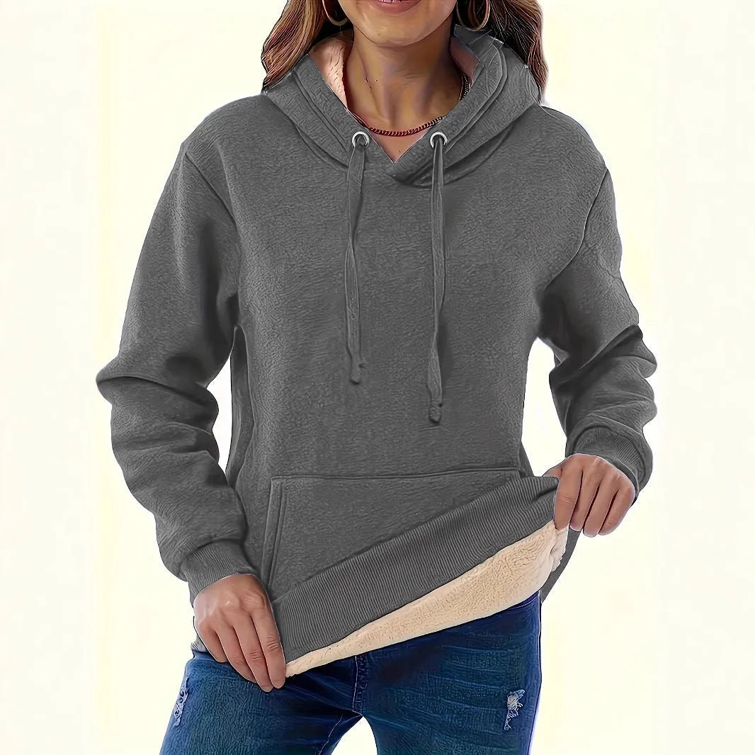 Women's loose-fit black hooded sweater with side pockets and a 3D pattern on the front.
