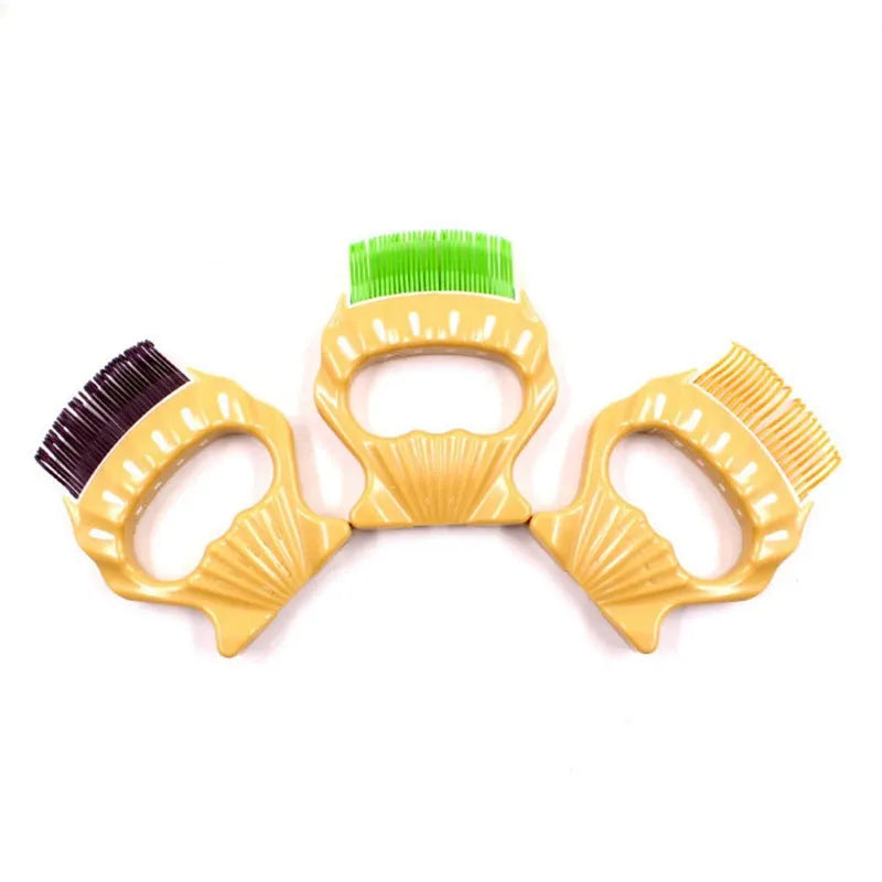Green shell-shaped plastic pet grooming comb with bent wire bristles and an anti-slip handle.