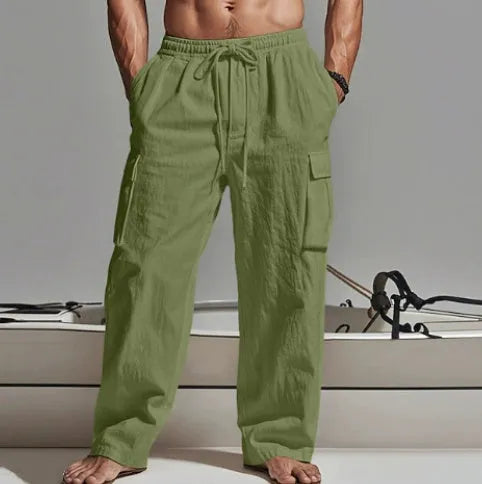Men's loose cotton wide-leg casual trousers in a solid colour on a hanger