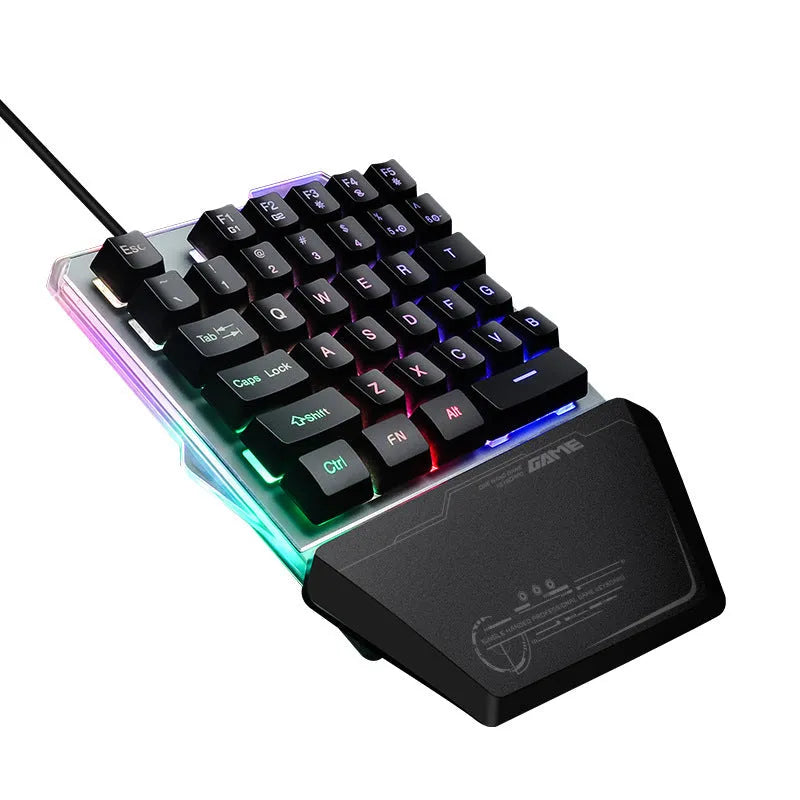 Black robotic one-handed gaming keyboard with RGB backlighting and USB cable