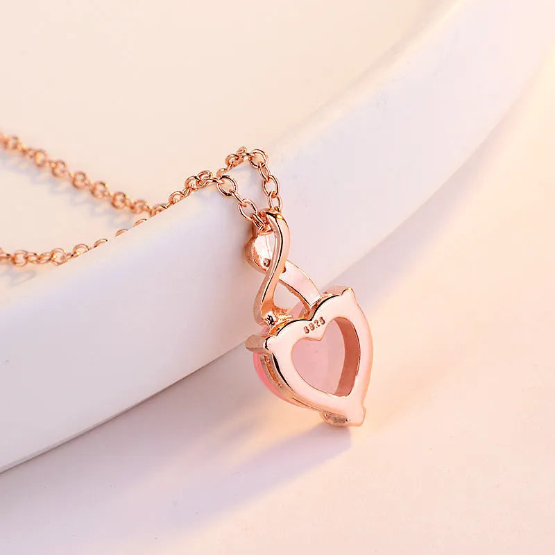 Women's heart-shaped pink synthetic crystal pendant necklace with rose gold electroplated chain