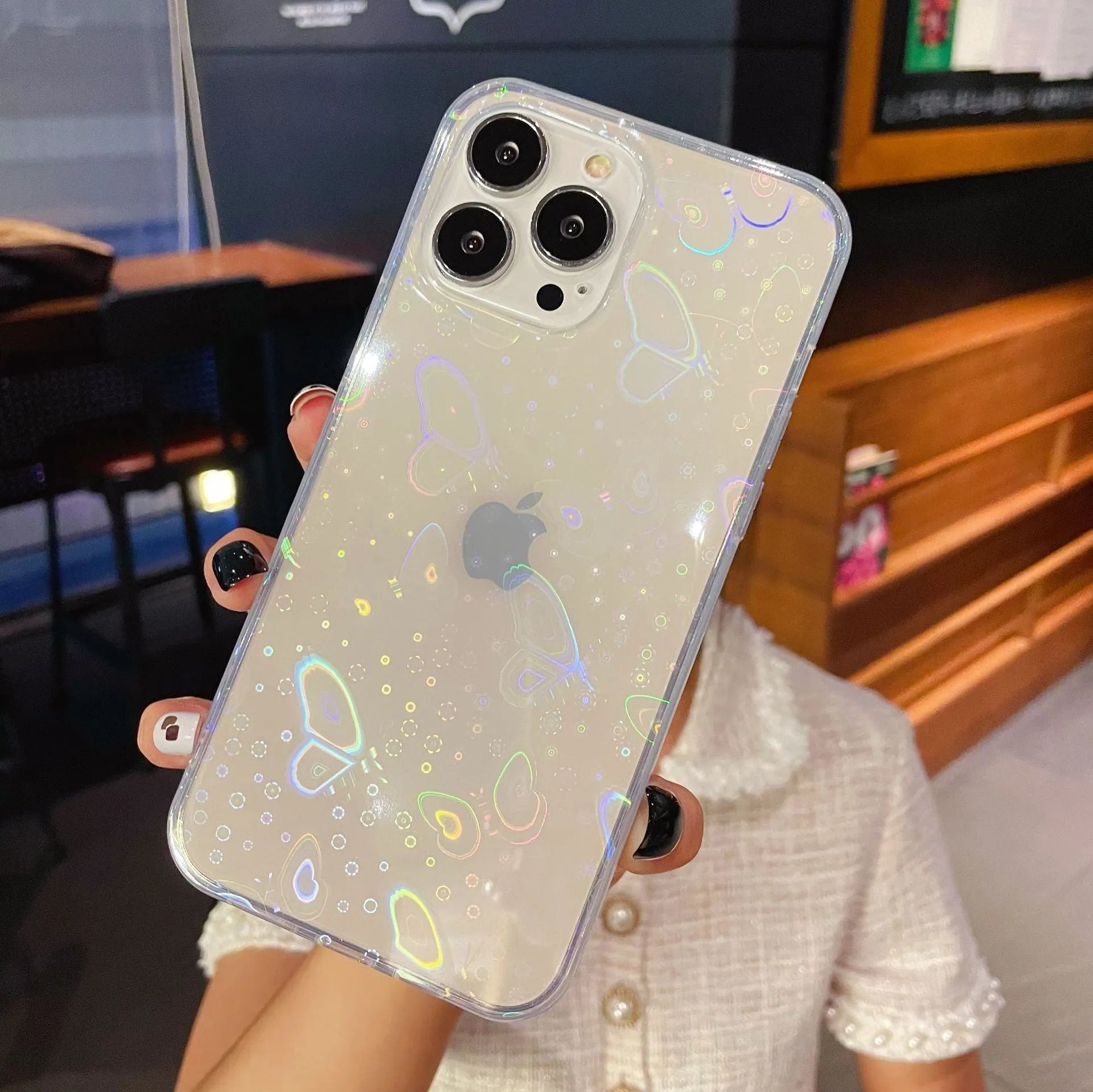 Transparent silicone iPhone case with laser colourful love design showing butterfly and clear colour options