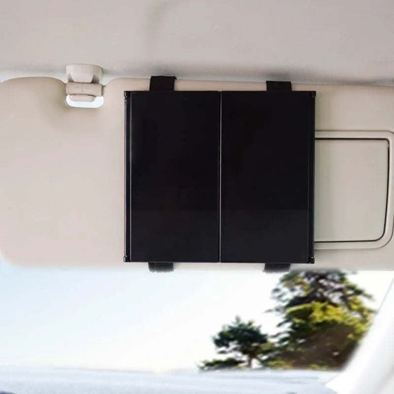 Silver car folding makeup mirror shown closed at 15.5cm width and opened at 30.5cm width