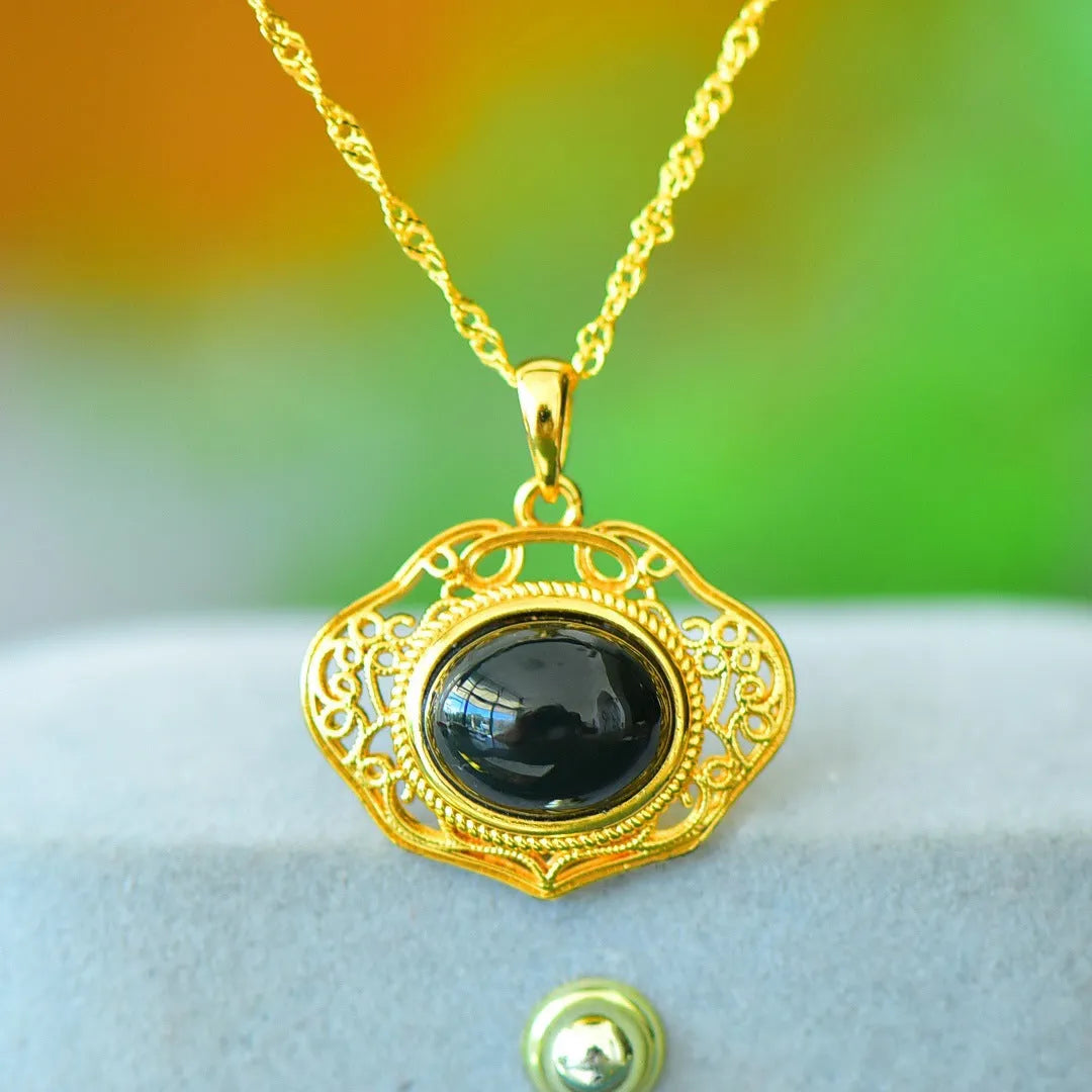 Natural Hetian gray jade pendant with copper inlay detailing showing ink blue jadeware patterning
