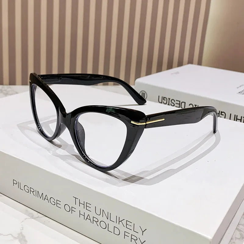Women's cat eye shaped presbyopic reading glasses with dragon and phoenix decorations on the frame.
