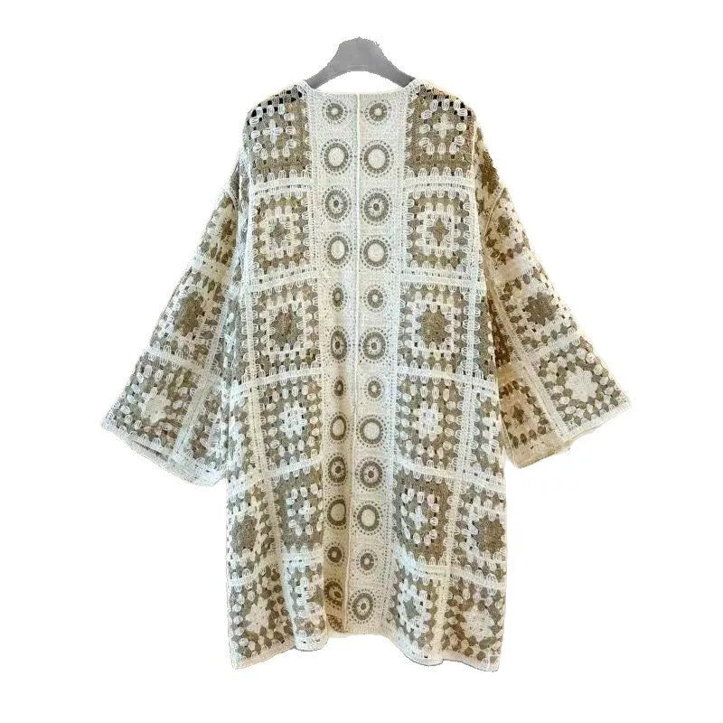 Ladies' loose embroidered thin knit cardigan in brown, front view on model