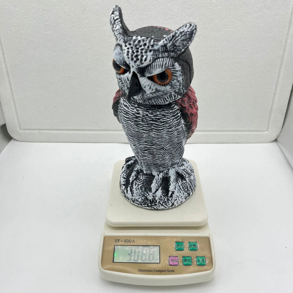 PE plastic artificial owl bird scarer ornament with shaking head, shown in bag-style mounting option.