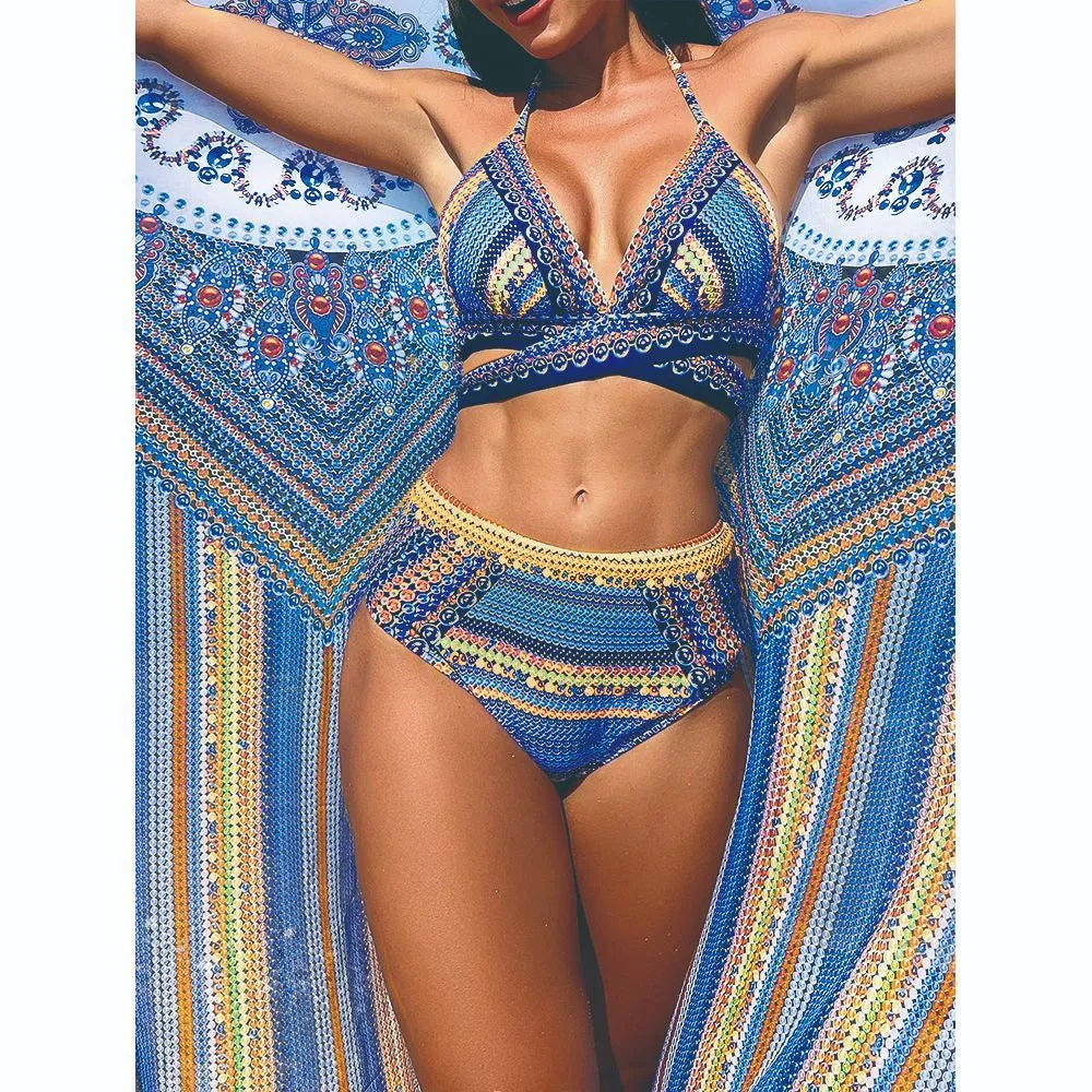 Blue women's three-piece bikini swimsuit with cross bandage design and high waist briefs.