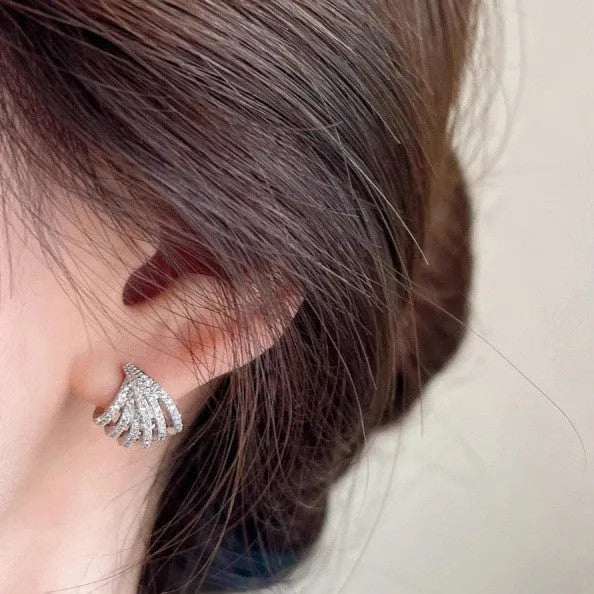 Geometric zircon earrings with platinum electroplated finish and clean line design