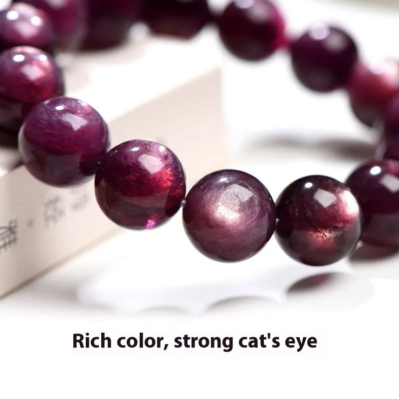 Purple lepidolite crystal round bead bracelet showing polished surface and geometric bead arrangement