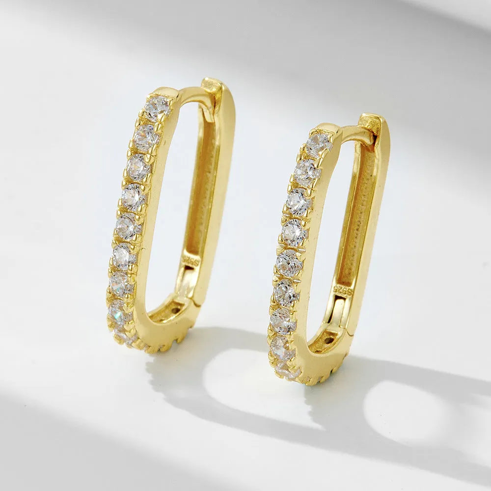 S925 sterling silver oval zircon ear clips with geometric design and diamond cut treatment