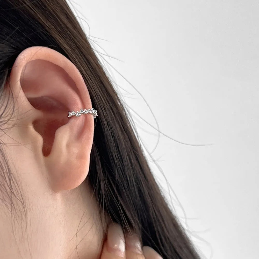Sterling silver ear clip with leaf shape and zircon inlay in gold electroplated finish for women