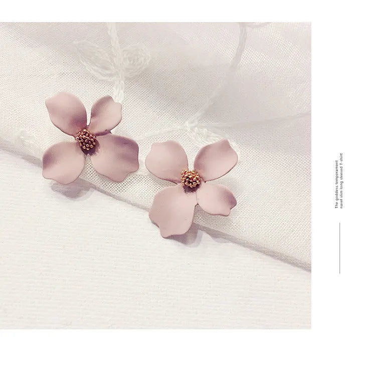 Alloy flower stud earrings for women in white or pink electroplated colour options