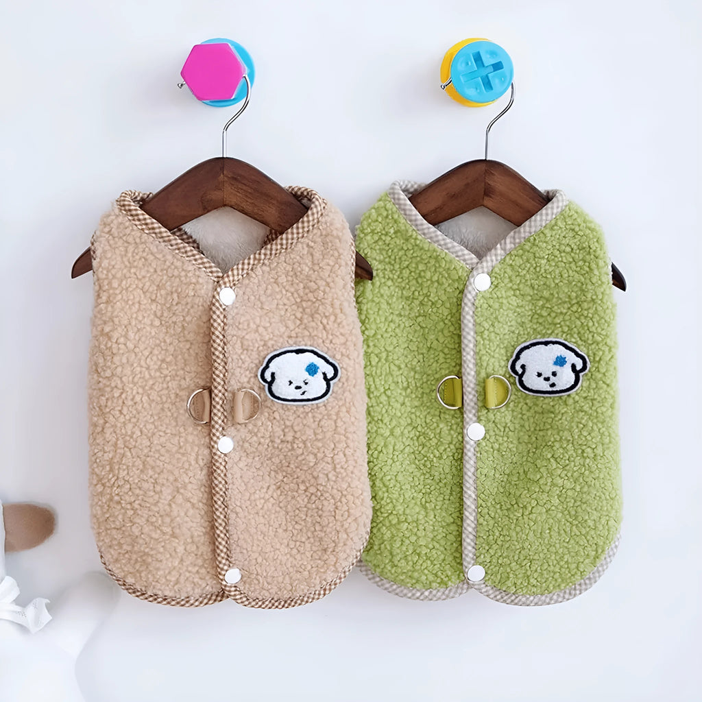 Green coral fleece dog vest with a metal leash ring on the back for a small dog.