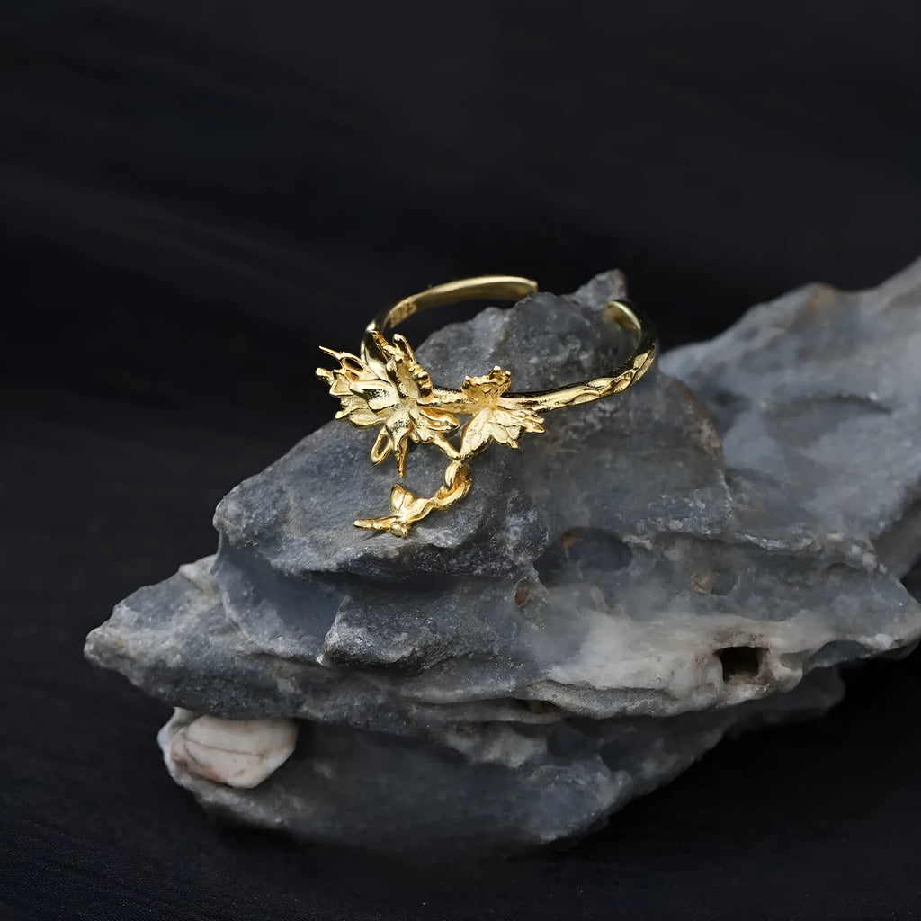 Adjustable opening silver butterfly ring with electroplated finish in white gold or 18K gold colour options