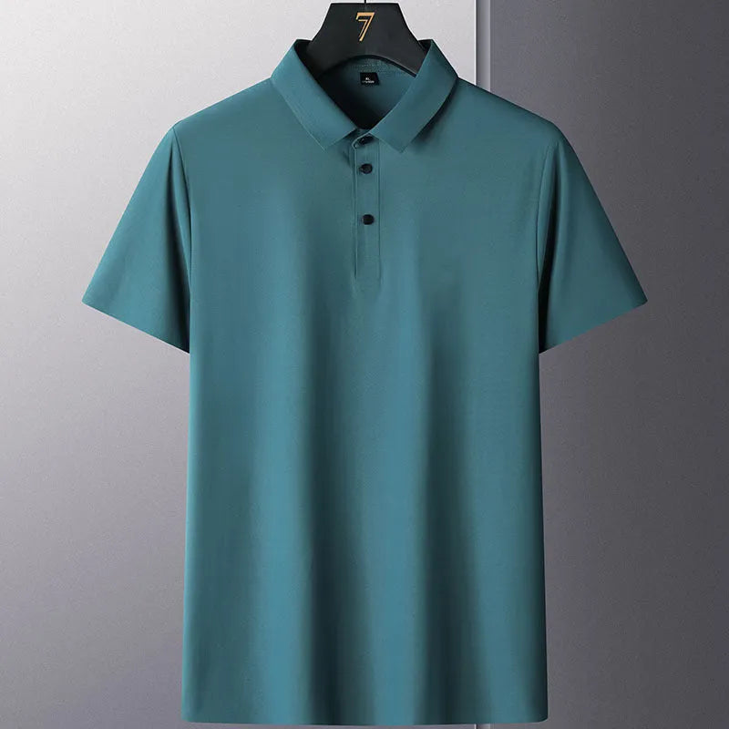Man wearing a solid colour non-ironing short sleeve casual top in a navy blue shade.