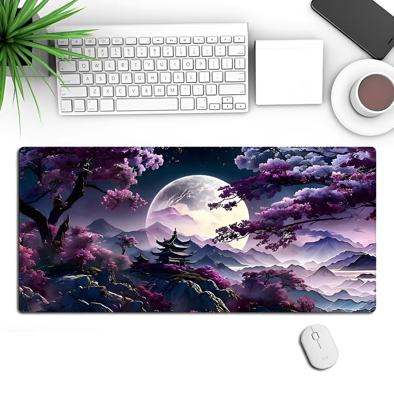 Large 400x900mm black gaming desk mat with geometric pattern, showing keyboard and mouse placed on it.