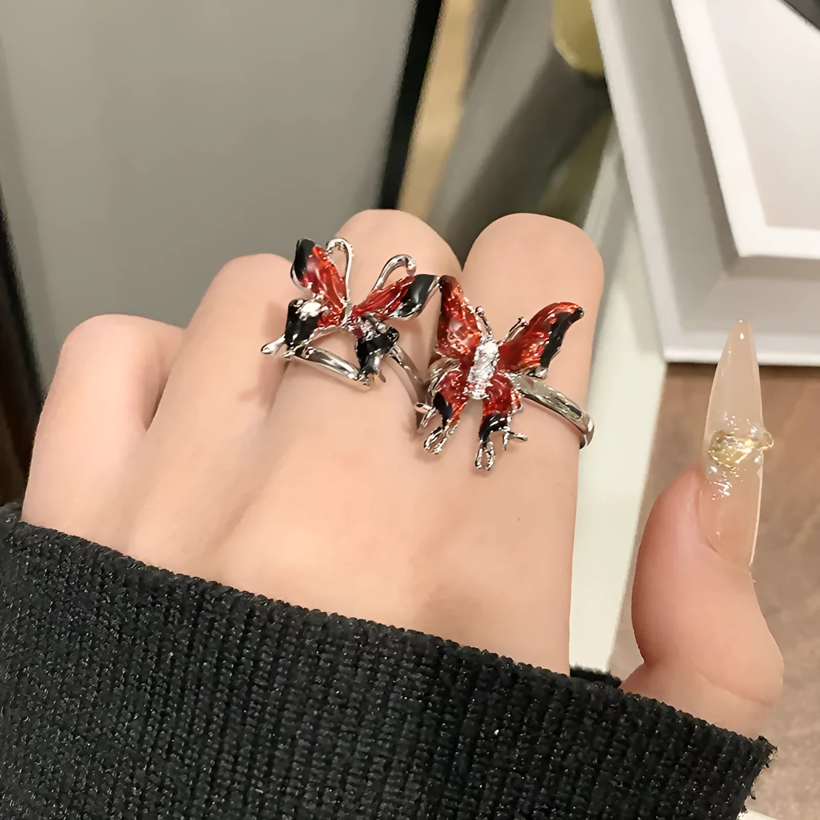 Adjustable open loop copper butterfly ring for women in a creative Chinese design.