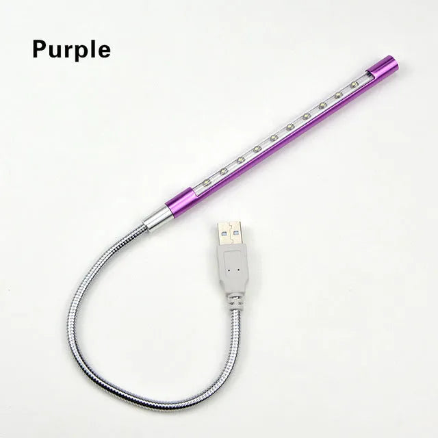Spiral-shaped aluminium USB desk lamp in metallic colour, showing its 420mm height and push-button switch.