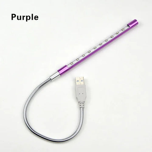 Spiral-shaped aluminium USB desk lamp in metallic colour, showing its 420mm height and push-button switch.