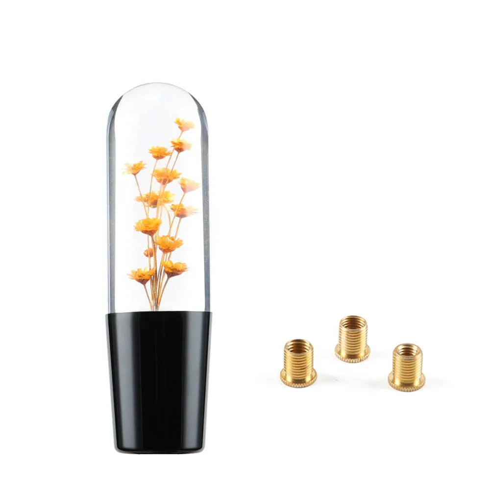 JDM crystal car gear knob with flower-in-water design, 15cm long, shown with three fitting adapters