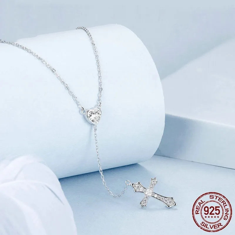Silver V-neck cross pendant necklace on O-ring chain, colour BSN384