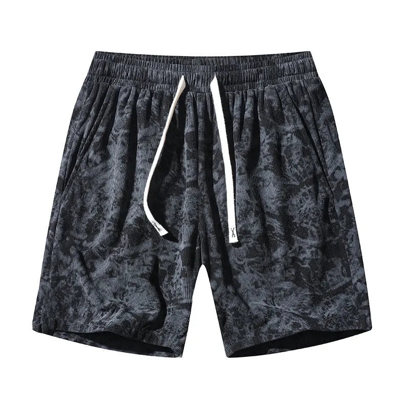 Men's camouflage patterned corduroy shorts with elastic high waistband in straight leg cut.