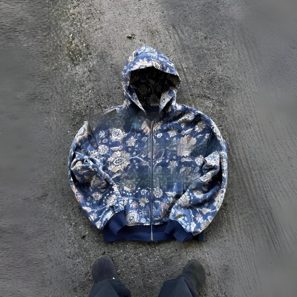 A man's loose-fitting red hooded zip-up coat with long sleeves, shown on a size chart.