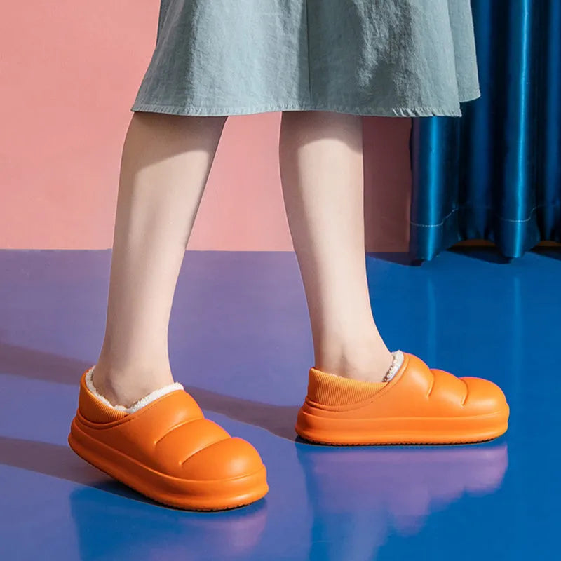 Waterproof EVA couple slippers in multiple colours with a non-slip sole and plush lining for winter.