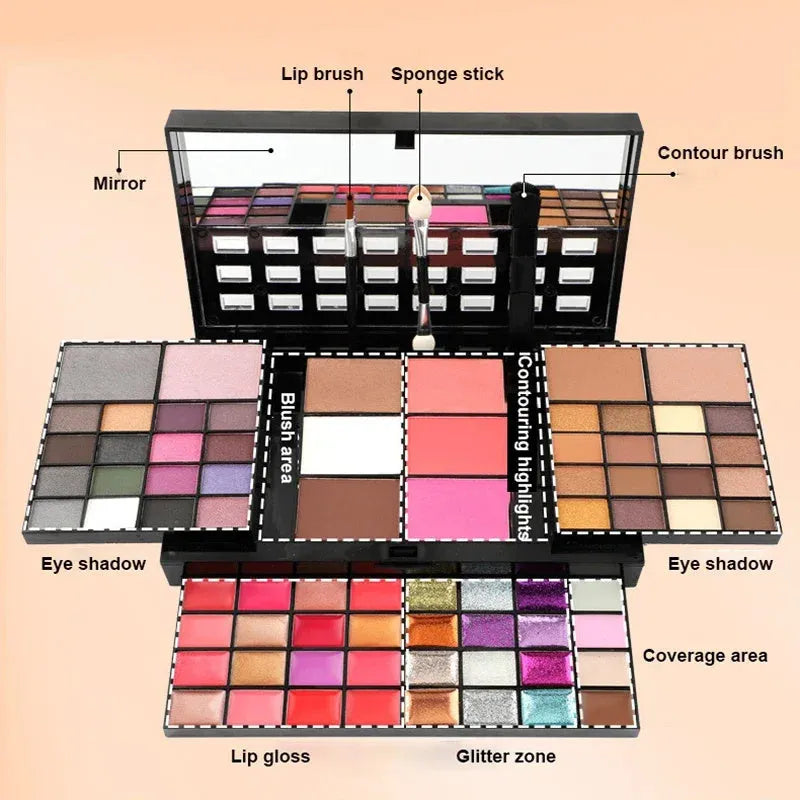 Open 74-colour makeup palette showing four layers of eyeshadow, lip gloss, blush, and contour powders with included brushes.