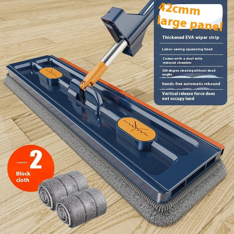 Large flat mop with stainless steel handle and blue cloth on hard floor