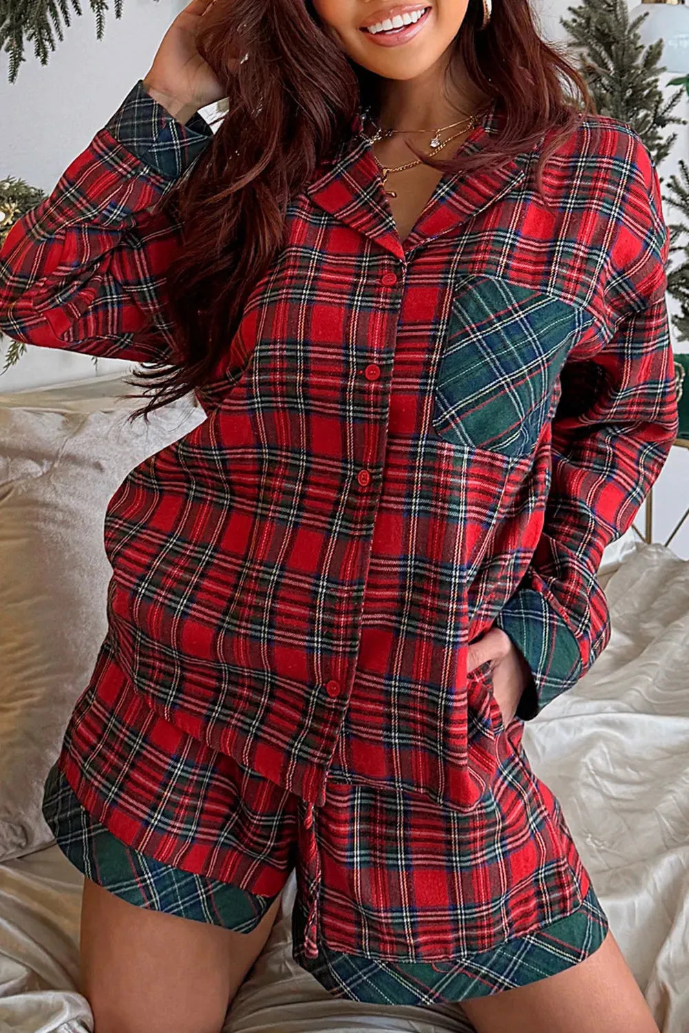Red plaid long sleeve pyjama shirt and shorts set with contrast patches on the collar.