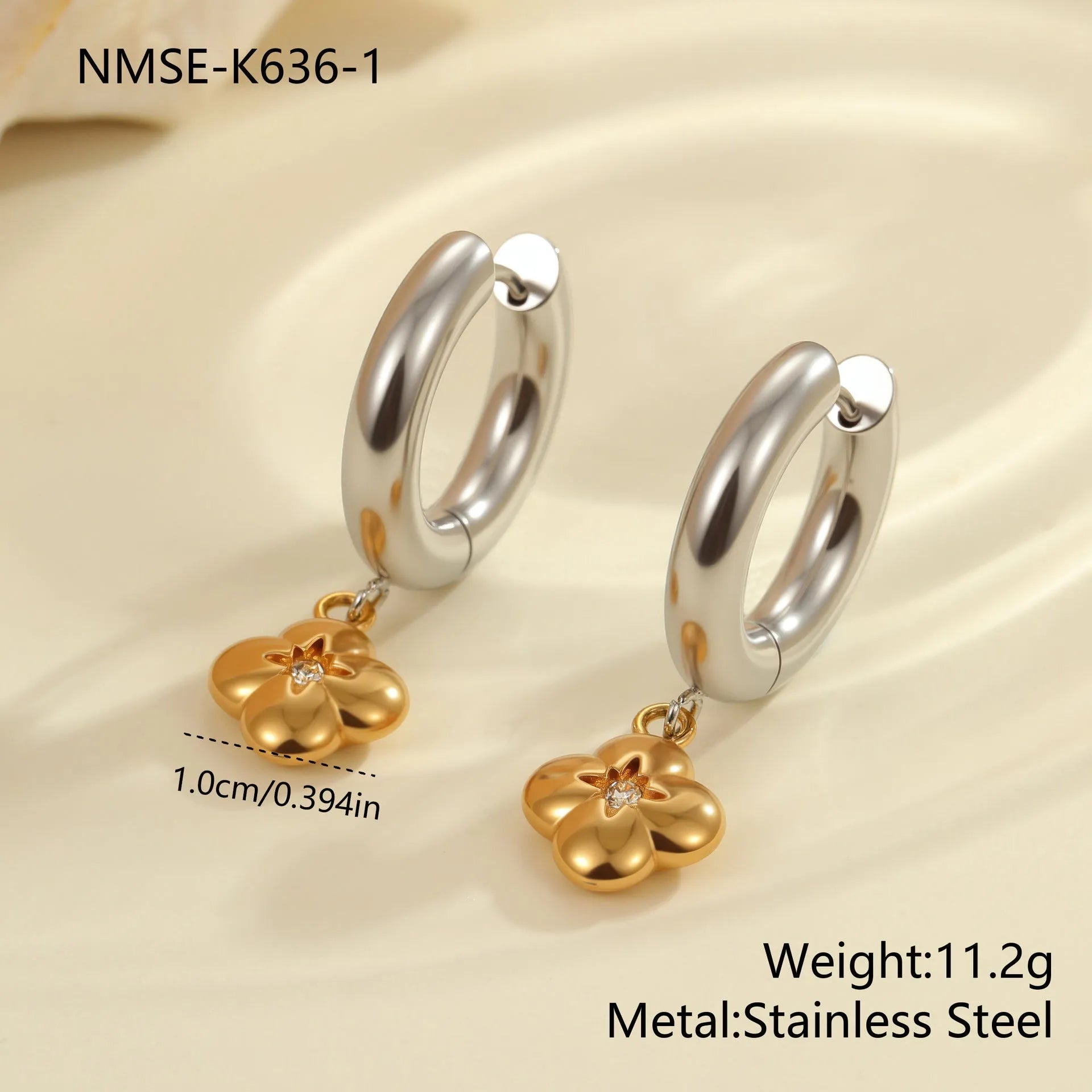 Christmas tree shaped stainless steel earrings with 18K gold electroplated finish and heart star geometric accents