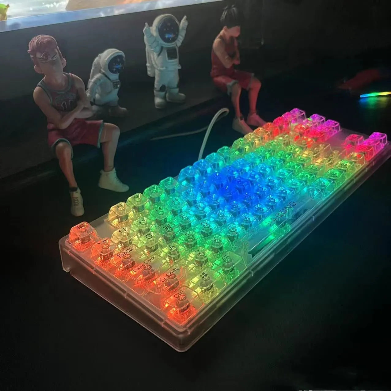 Full set of 132 transparent plastic key caps for mechanical keyboards laid out.