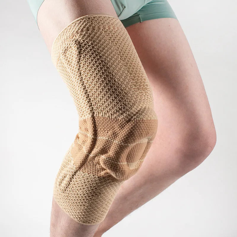Black and blue adult sports knee pad for basketball and running, made of nylon and spandex.