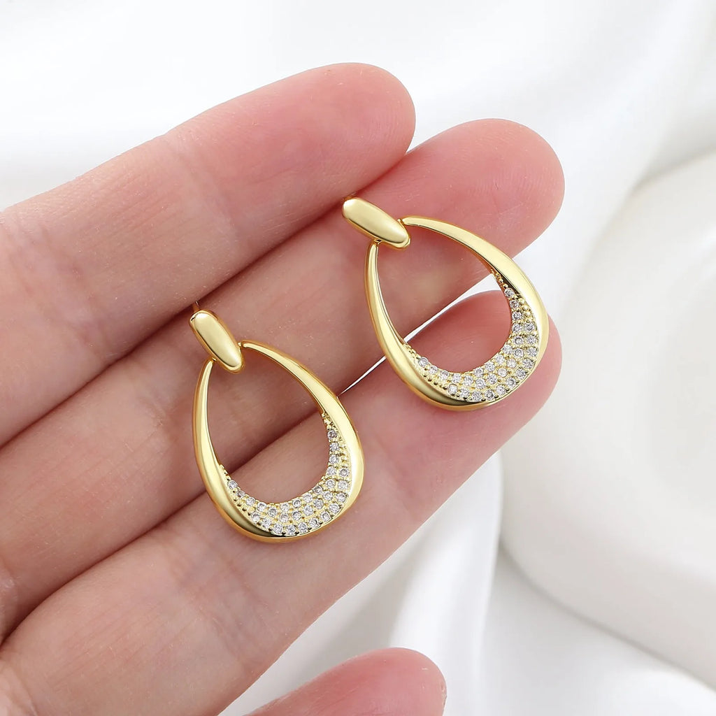 Yellow gold geometric drop earrings with zircon accents, measuring 2.6cm long by 1.7cm wide