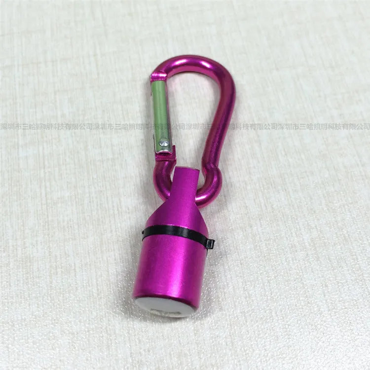 LED pet light in silver with copper alloy body showing 60mm length and 12mm width on a dog collar