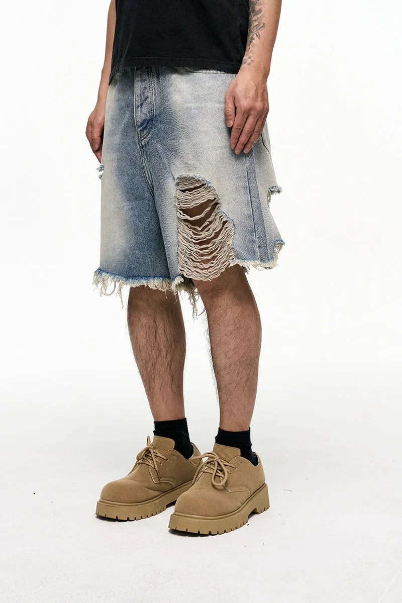 Men's light blue retro washed baggy denim shorts with wide leg and zipper fly