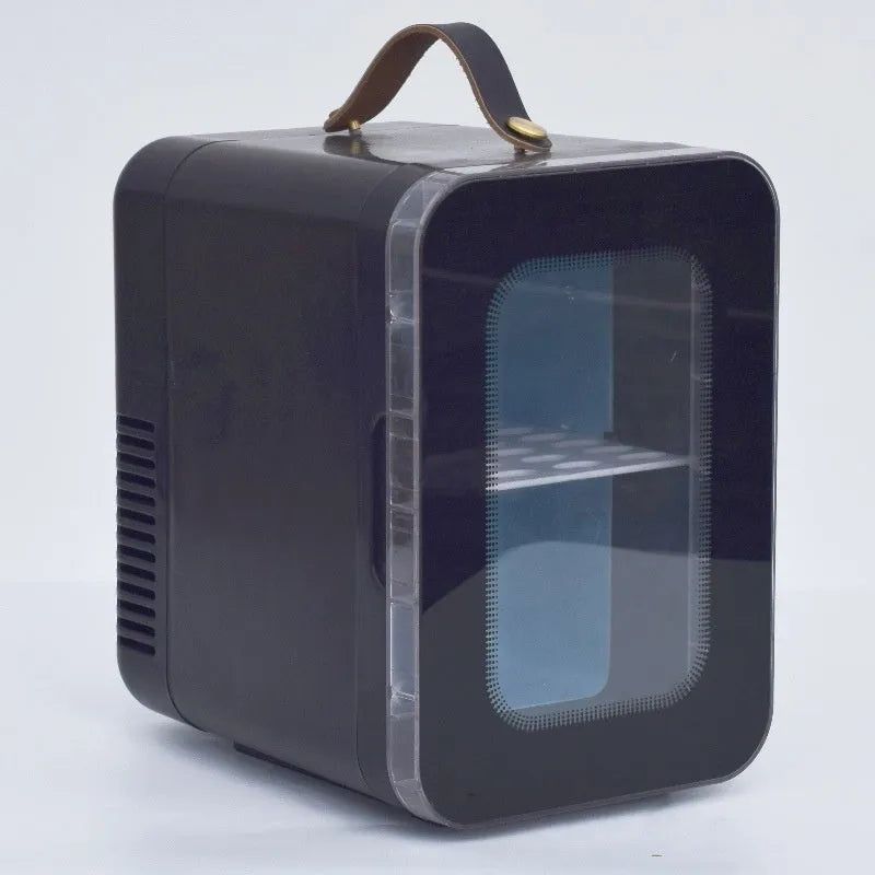 Pink mini refrigerator with transparent door showing interior storage for cosmetics