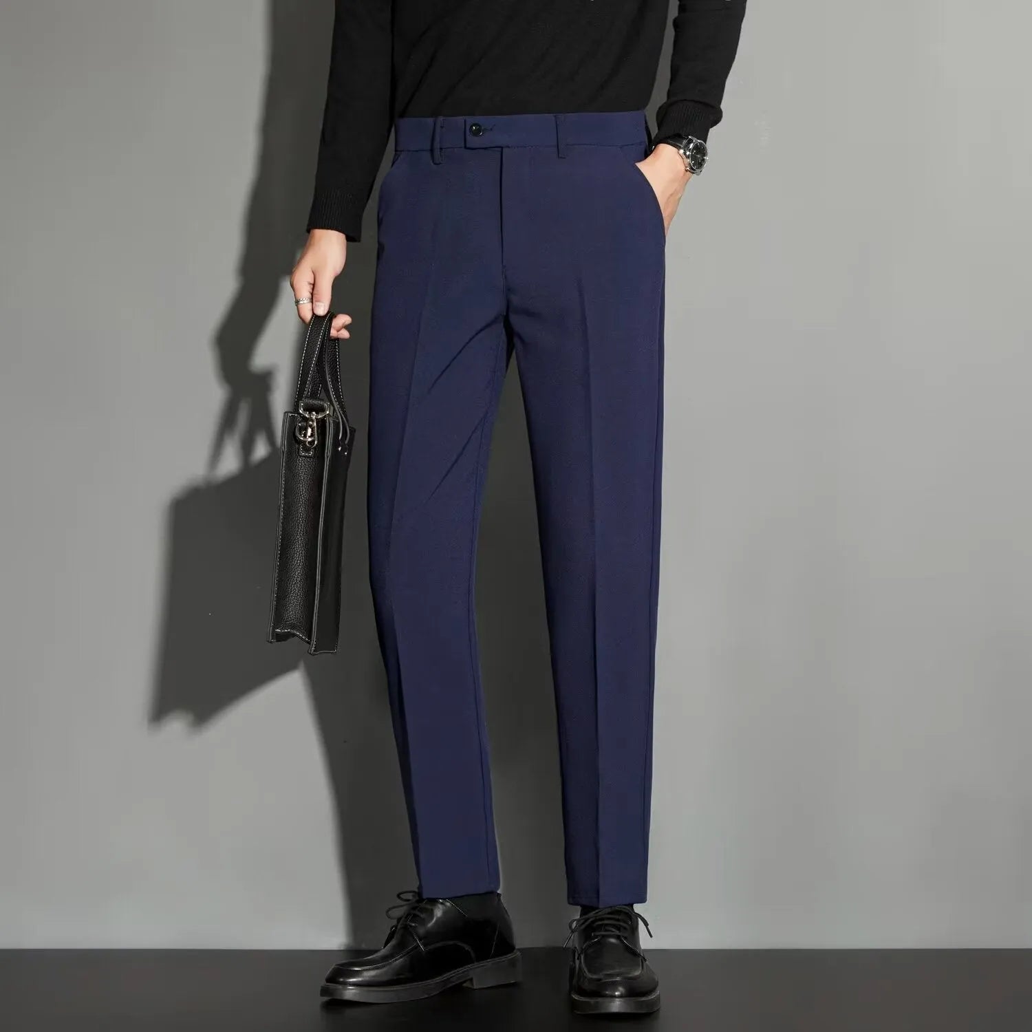 Men's straight leg ankle-length suit trousers in a polyester blend fabric, shown in multiple colours.