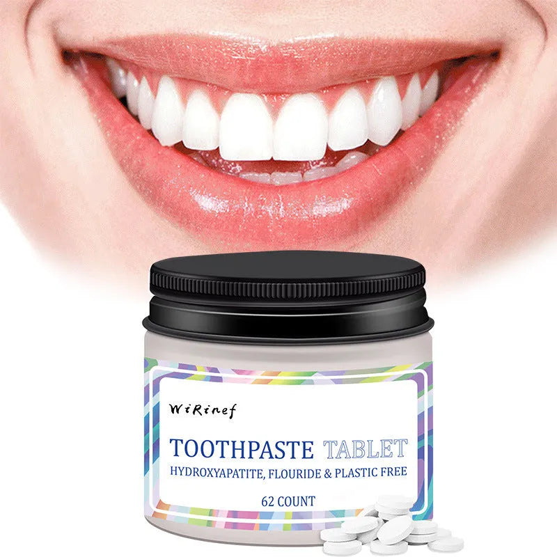 Pack of 62 white solid chewable toothpaste tablets for portable oral cleaning.