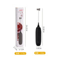 Black and white handheld electric milk frother with blending function on kitchen counter
