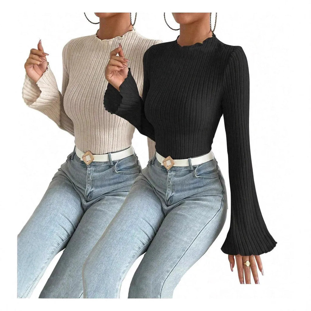 Long sleeve round neck top in black with sunken stripe pattern and lantern sleeves