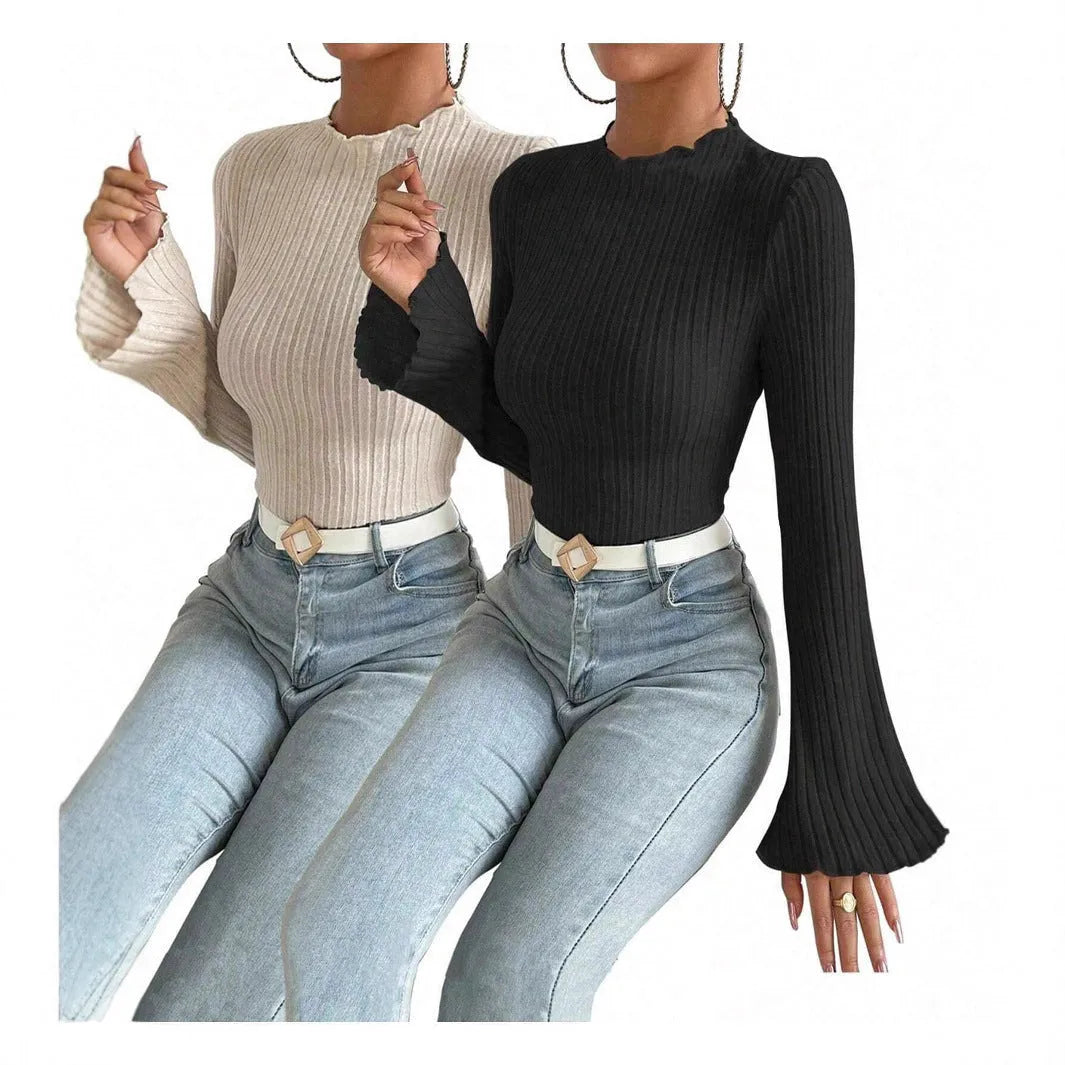 Long sleeve round neck top in black with sunken stripe pattern and lantern sleeves