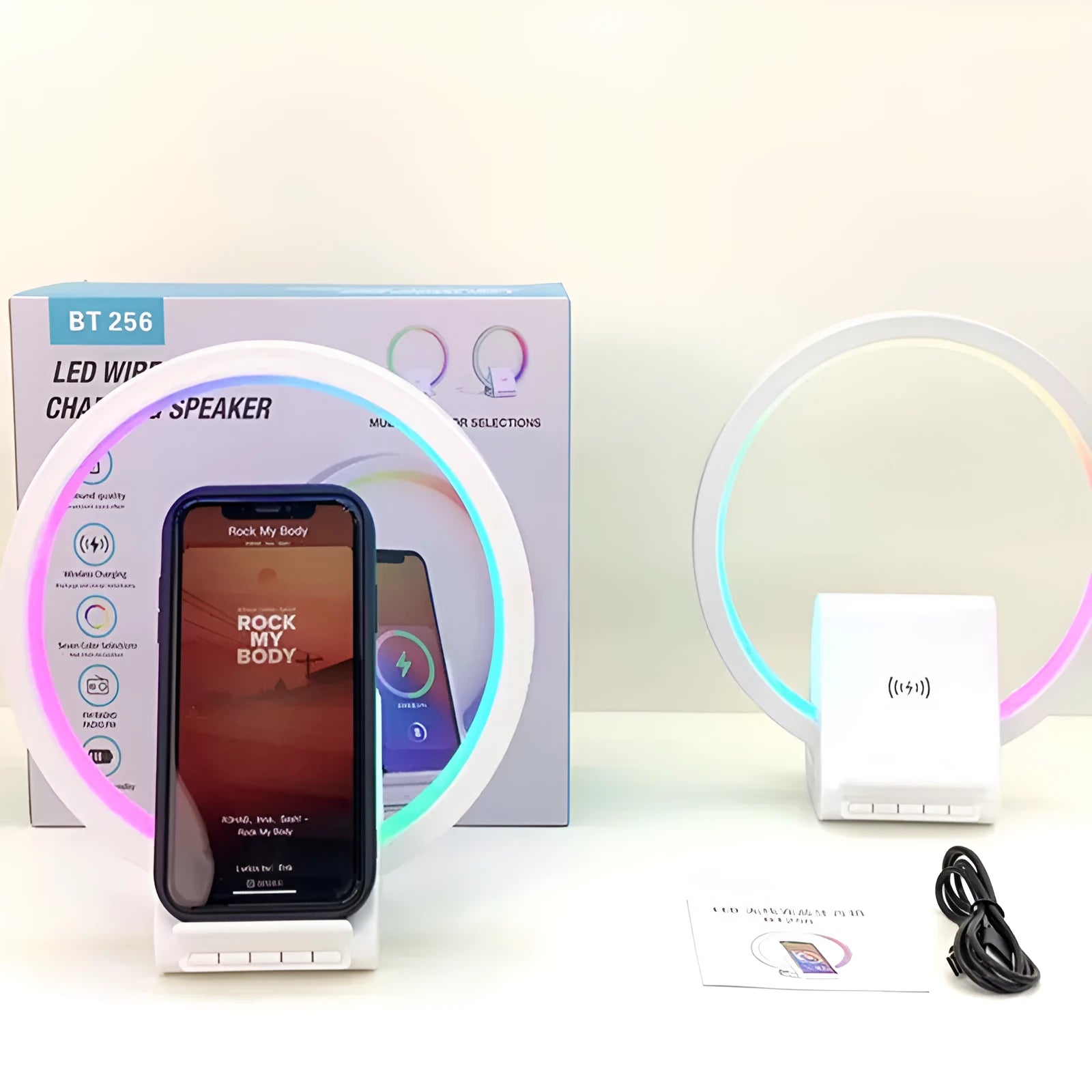 White rectangular Bluetooth speaker with wireless charging top and slim 10mm profile
