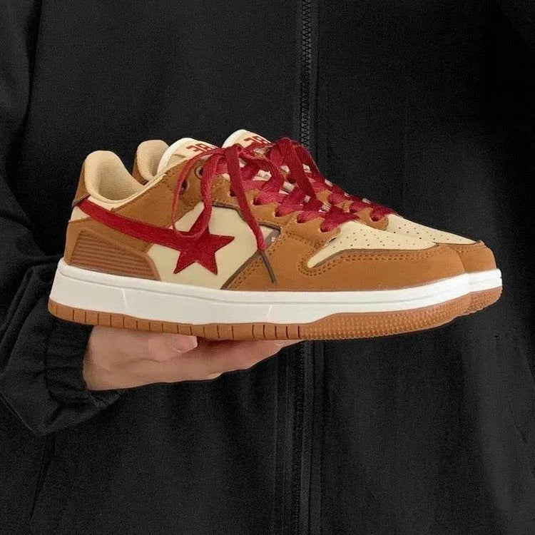 Brown women's platform sneakers with sequin details and a lace-up front.