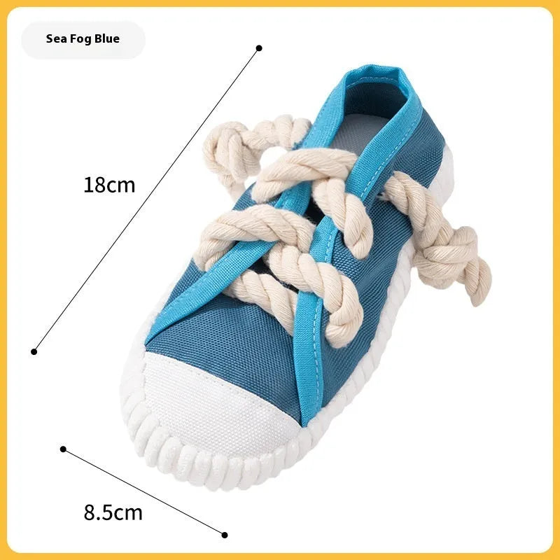 Plastic dog sound slippers chew toy in yellow, black, or blue with bends and hitches for teething.